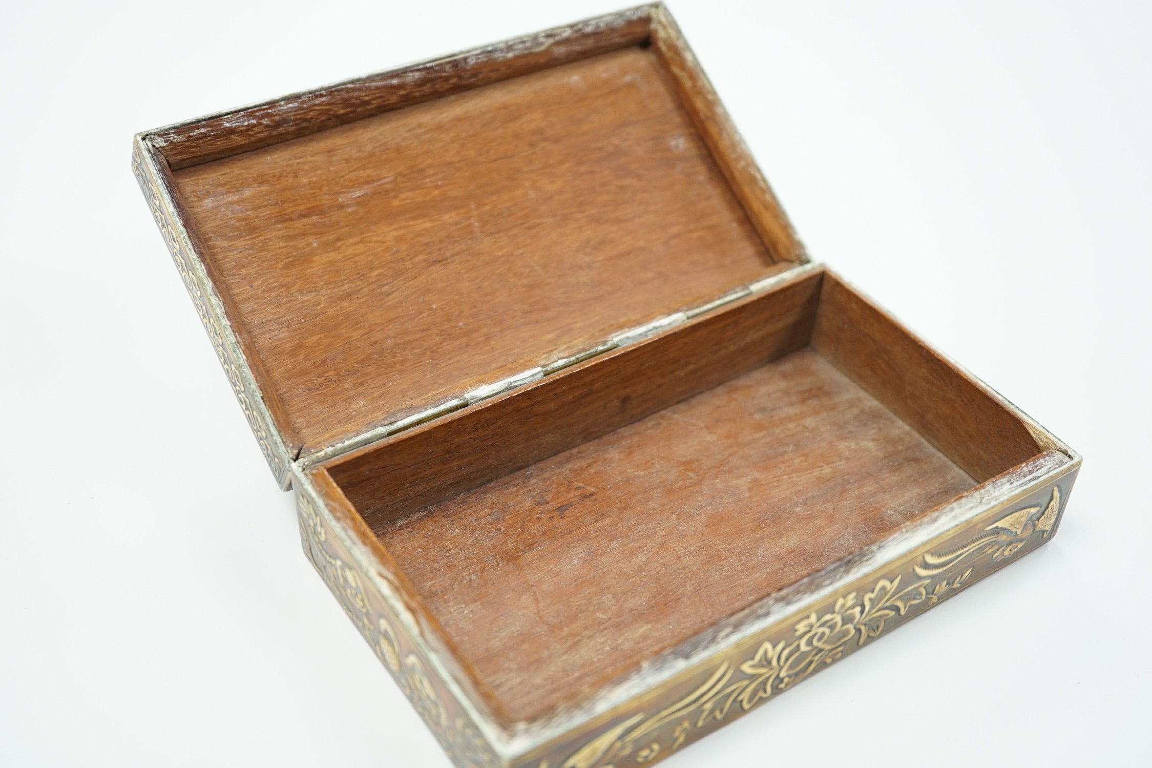 A Chinese brass 'dragon' cigarette box, 15.5cm